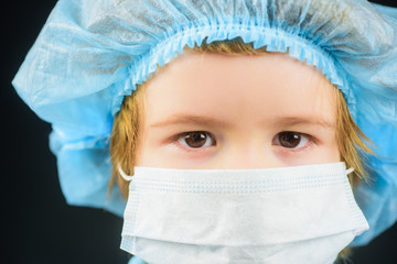 Virus and infection control concept. Illness prevention. Concept of coronavirus quarantine or covid-19. Protection against coronavirus. Small boy with mask on face. Toddler in medical mask. Closeup.