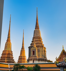 Fototapeta premium Classical Thai architecture of Wat Pho public ancient temple in Bangkok, Thailand.