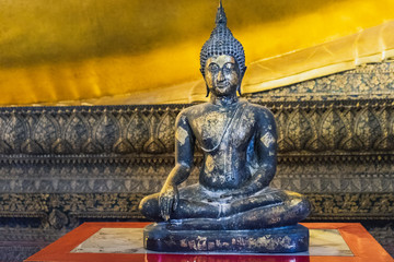 Asian style Buddha Art. Small Buddha statue in Wat Pho Temple, Bangkok, Thailand