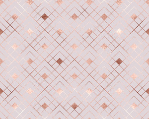 Geometric seamless pattern with rose gold rhombuses tiles.