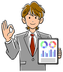 タブレットPCを持ちOKのサインを出すビジネスマン