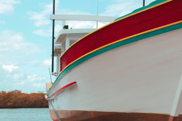 anchored colorful boat