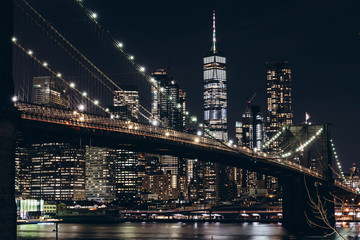 Fototapeta na wymiar New York City skyline night view. Brooklyn bridge night view. World Trade Center night view. 