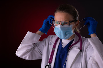 COVID-19 healthcare worker using PPE protective equipment
