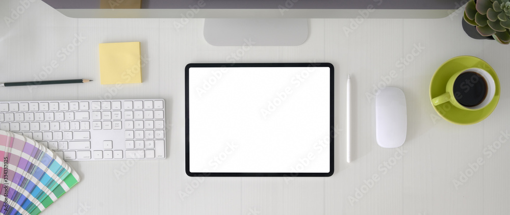 Aufkleber top view of graphic designer workspace with blank screen tablet, computer device and designer suppli