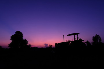 silhouette of tractor