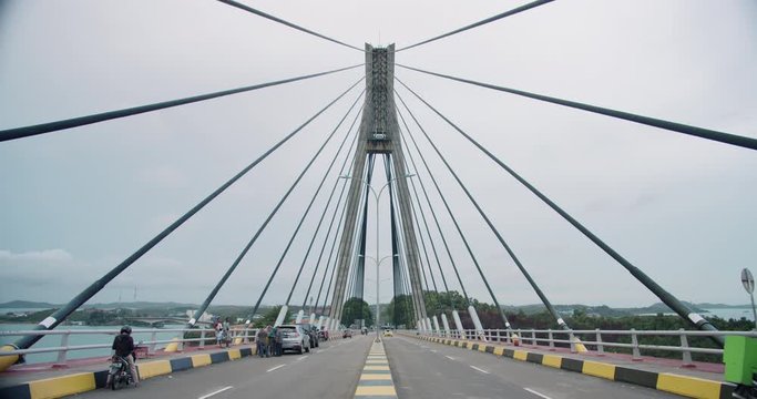 Timelapse of Barelang Bridge in Batam Indonesia with cars and motorcycles passing