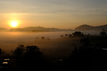 Morning sunrise with fog. Natural landscape