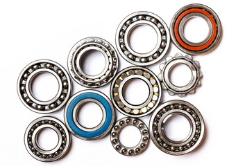 Set of various  roller bearing on white background isolated. Metal  autotechnology background.  Part of the car