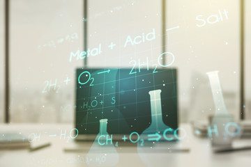 Creative chemistry hologram on modern laptop background, pharmaceutical research concept. Multiexposure