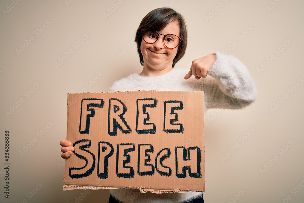 Sticker young down syndrome woman holding protest banner of free speech for communication rights with surpri