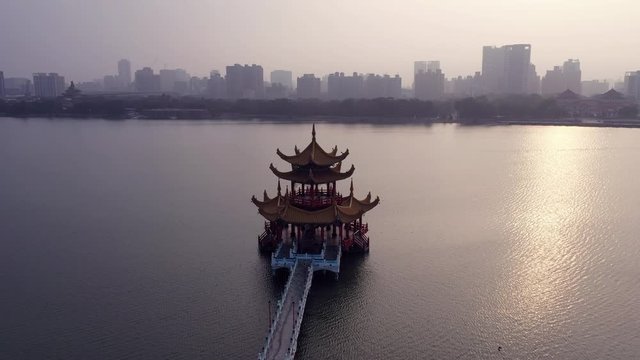 4k Aerial Footage of Tourists visiting Dragon and Tiger Pagodas in Kaohsiung City,Taiwan