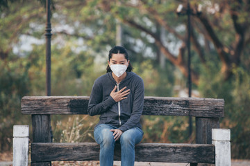 woman wearing a mask vent the outbreak of the virus concept for environmental pollution and health,medical.Insurance for your healthcare,disease,dust,smoke,dirt in the city