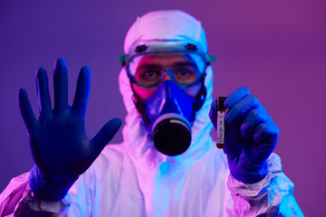Coronavirus, Doctor holding positive covid-19 virus Blood Sample test tube