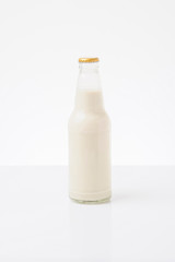 Milk bottle on white background.