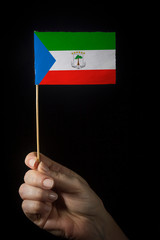 Hand with flag of Equatorial Guinea