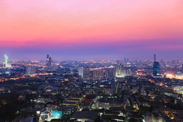 Fototapeta premium Cityscape view Twilight Sunset Through Town of Bangkok city It is a modern capital. Bangkok Thailand