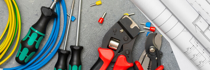 Tools and tips of various sizes and colors for crimping stranded electrical wires. Crimping tools,...