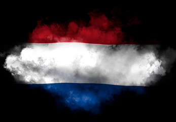 Dutch flag performed from color smoke on the black background. Abstract symbol.
