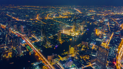 Fototapeta premium Cityscape view Twilight Sunset Through Town of Bangkok city It is a modern capital. Thailand
