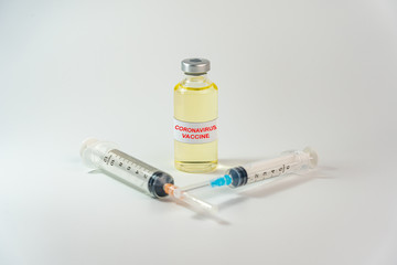 Coronavirus vaccine bottle on the white background