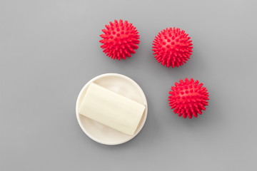 Coronavirus and soap on grey background top-down