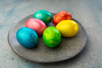 selective focus, colored chicken eggs with food dye