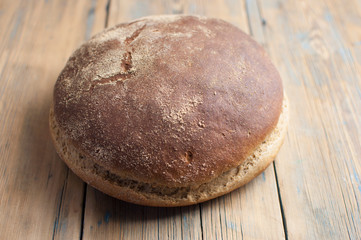 freshly baked bread on rustic wooden table