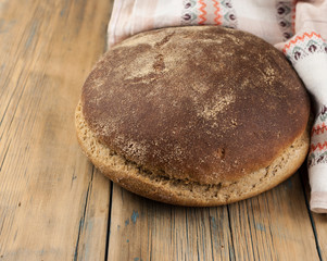 freshly baked bread on rustic wooden table