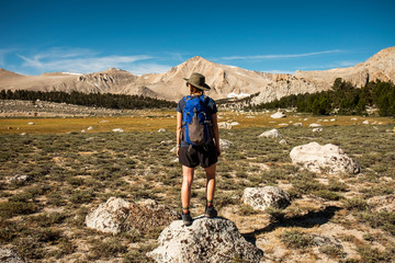 Female Hiker on Rock in Sierra Mountains