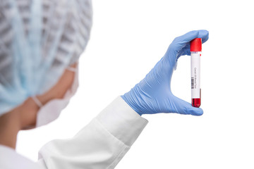 Gloved hand of female virologist in mask and whitecoat holding blood test