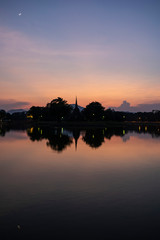 sunset temple over lake
