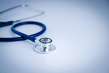 The blue medical stethoscope is placed on a white background. Help the doctor to listen to the...