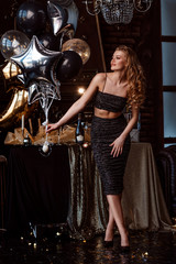 Girl's birthday or new year. Beautiful dress, balls, decor