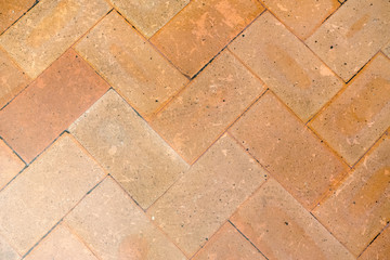 Obraz premium Vintage floor tiles in yellow and orange. As a background or for design.