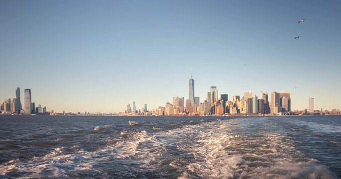 Hyperlapse From The Deck Of Staten Island Ferry. Downtown Manhattan Skyline And Statue Of Liberty Seen From The Sea.