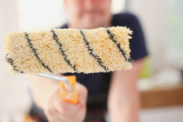 Smiling worker hold brush portrait. Manual job workplace DIY inspiration improvement fix shop...