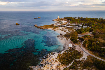 Aerial drone shot of Rottnest Island at sunrise. The Basin and Pinky beach can be seen below. 