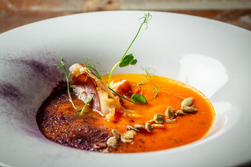 Pumpkin cream soup with bacon. healthy food