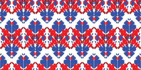 Red and blue embroidery ornament. Fashion texture for fabric textile.