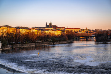 Panorama of Prague city with river Vltava, embankment and Prague castle.