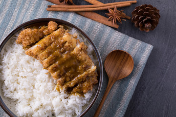 Fried pork with topped with curry powder.