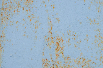 Old painted wall with cracked paint