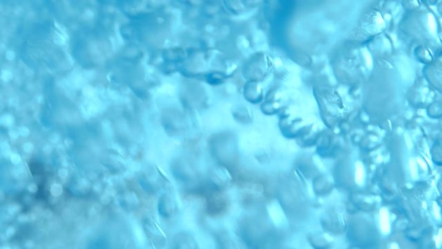 Abstract bubbles in blue water pool