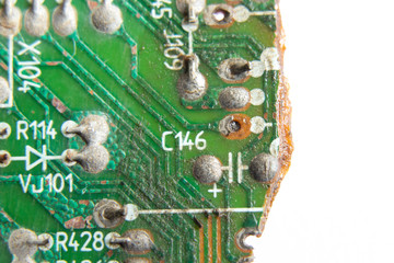 circuit board circuitry, disassembled computer as background,