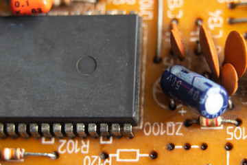 circuit board circuitry, disassembled computer as background,