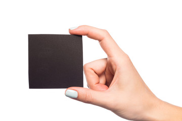 female hand isolated on white background holding card  with text place  - Image