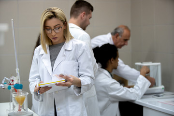Laboratory scientist working at lab with test tube
