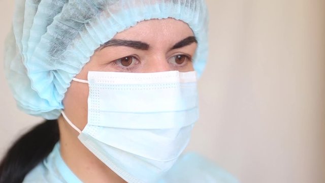 Close up face of medical worker. Pandemic medical health risk concept