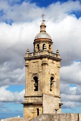 Fototapeta na wymiar View of Santa Maria church (Iglesia de Santa Maria La Mayor) bell tower, Medina Sidonia, Spain.
